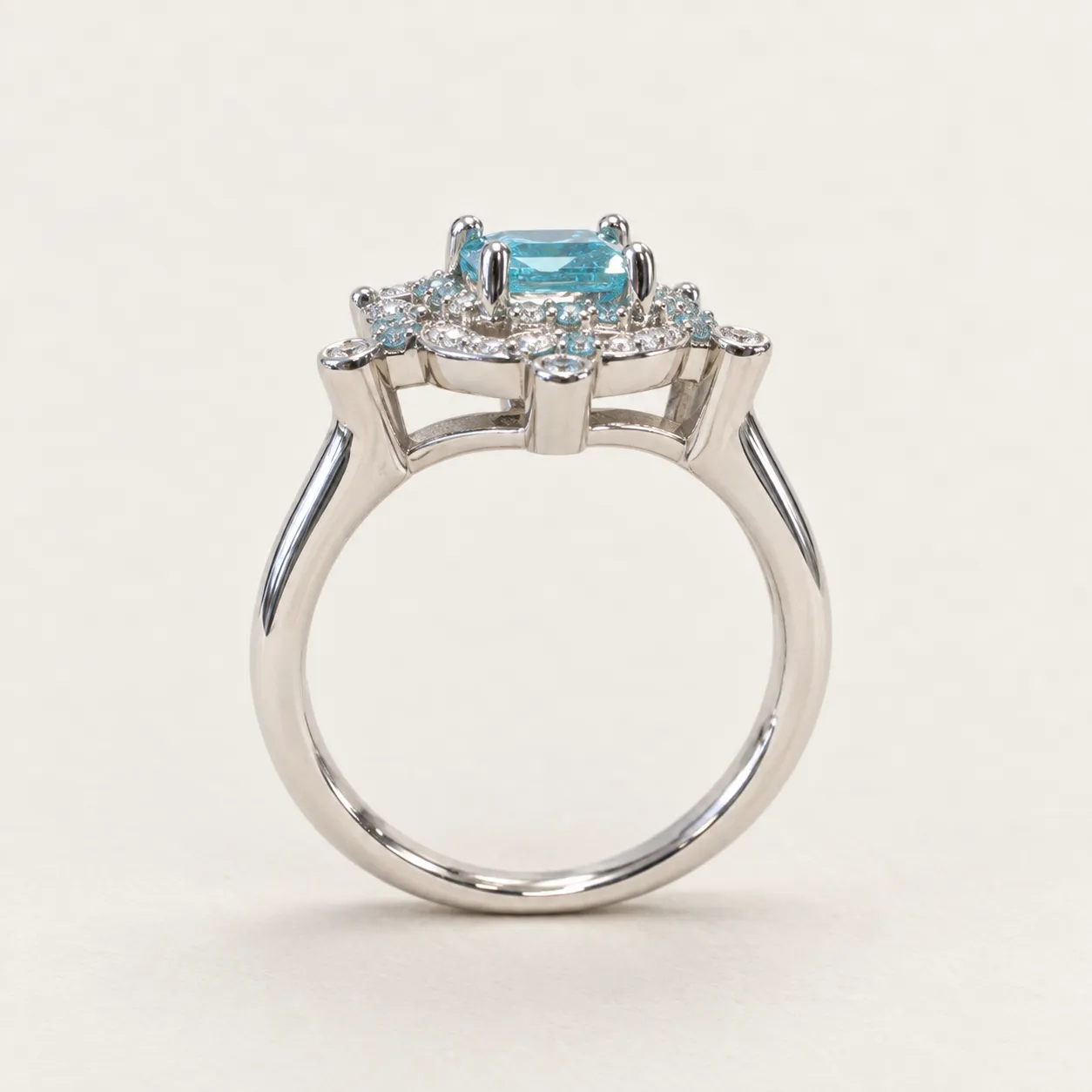 Side visualization of Natasha’s ring showing the raised setting, open gallery and plain band.